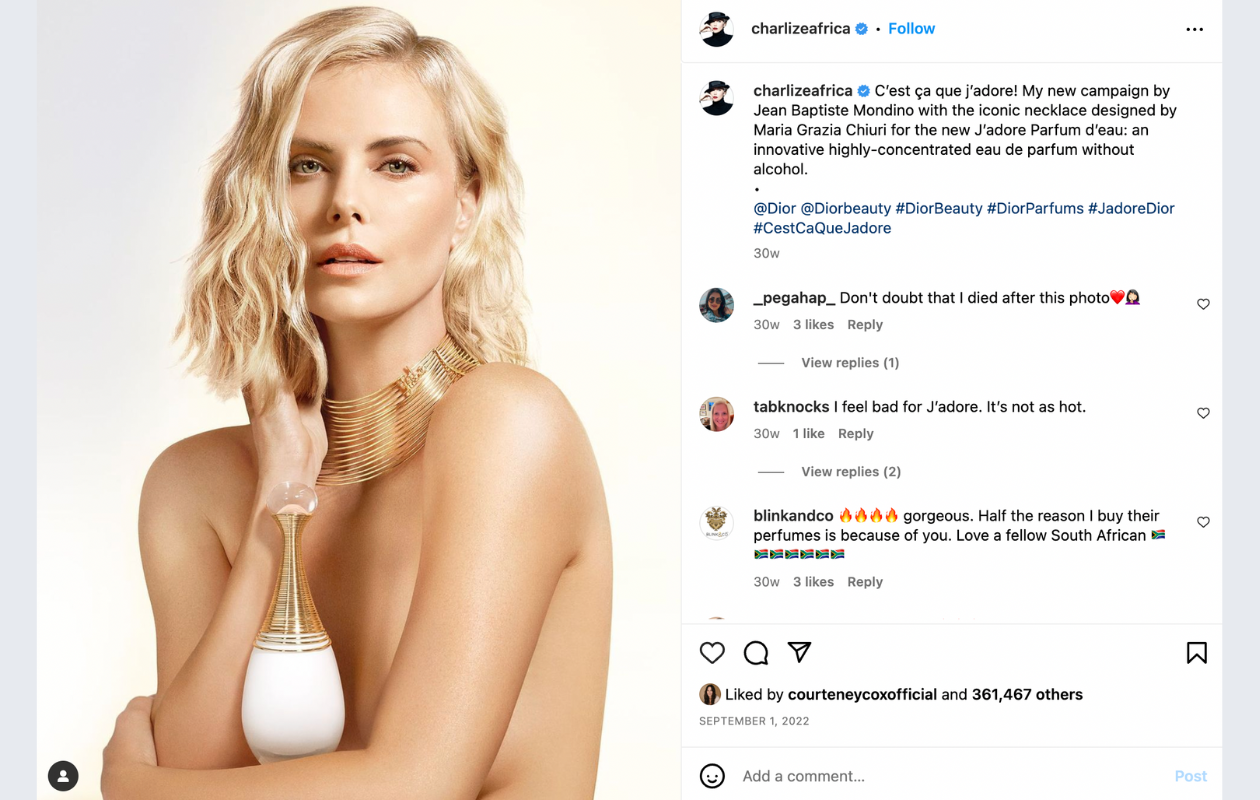 A screenshot from a dior beauty campaign for the jadore perfume with charlize theron