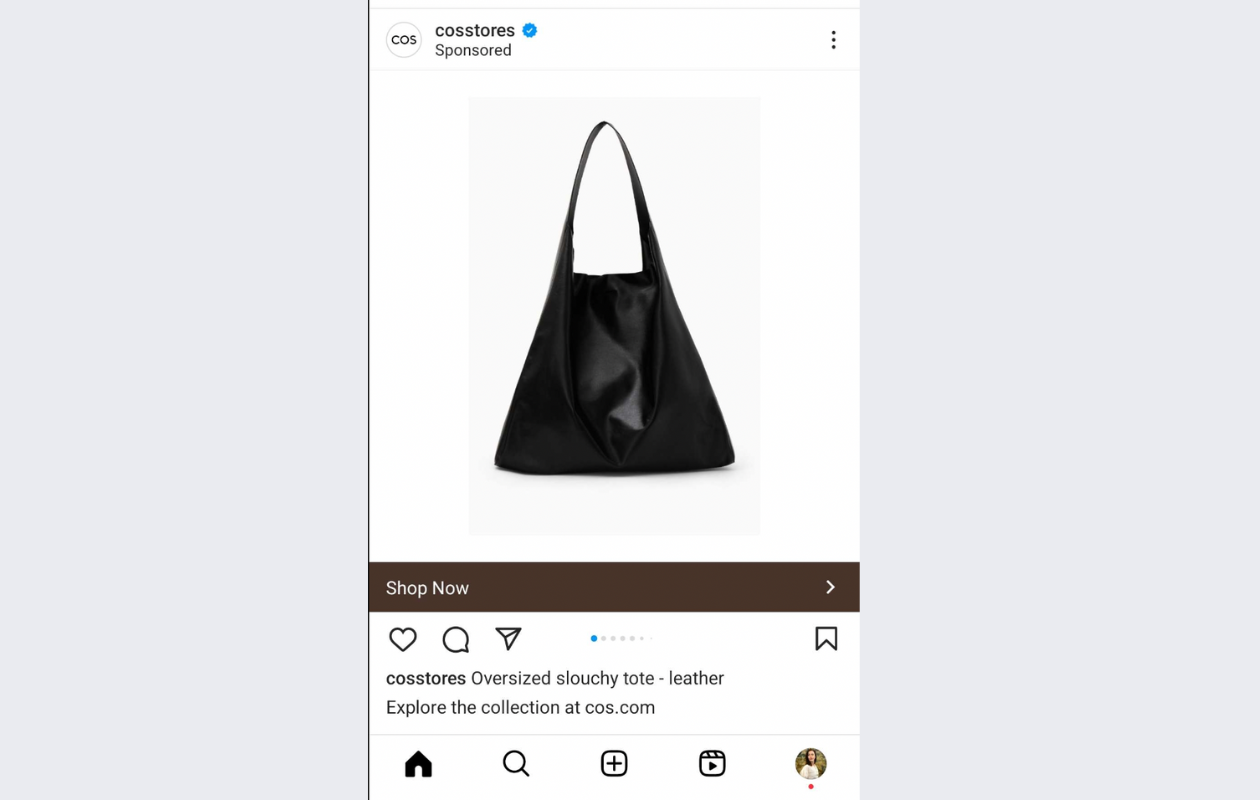 screenshot from instagram with an ad from cos stores showing a black bag