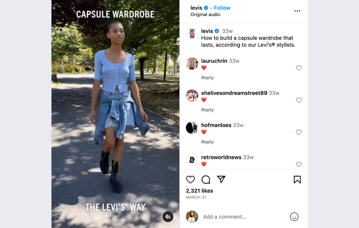 screenshot from levis' instagram reel with a girl wearing a blue top and a pair of levis shorts, walking in the park